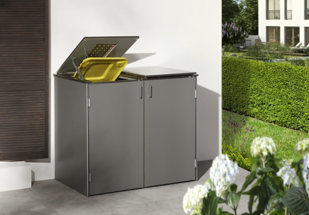 Mülltonnenbox aus Metall in Anthrazit mit Klappdeckel und Gelber Tonne – moderne Mülltonnenverkleidung von Klingenberg-Zäune aus Garbsen für Hannover und die Region